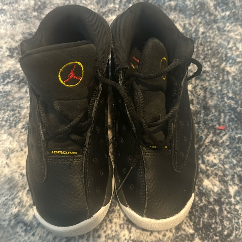 Toddler Jordan’s black and yellow